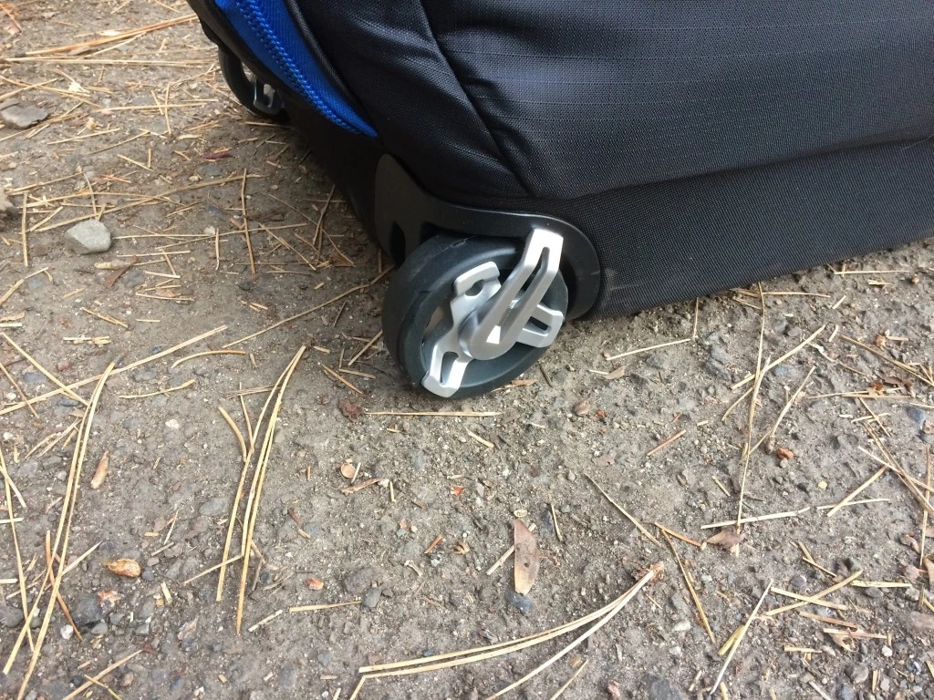 thule round trip traveler bike travel case review - the small, hard, plastic wheels offer a poor feel over rough cement.