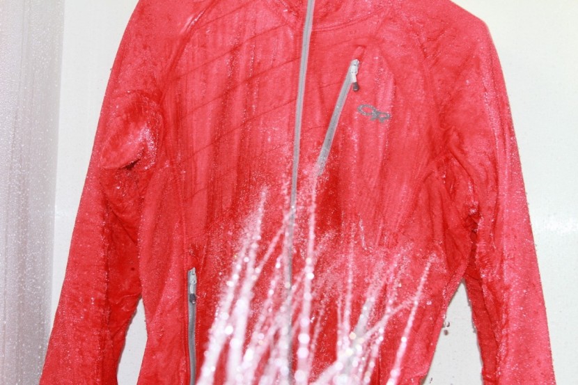 outdoor research refuge air hoody for women - spraying the jacket with water for about two minutes.