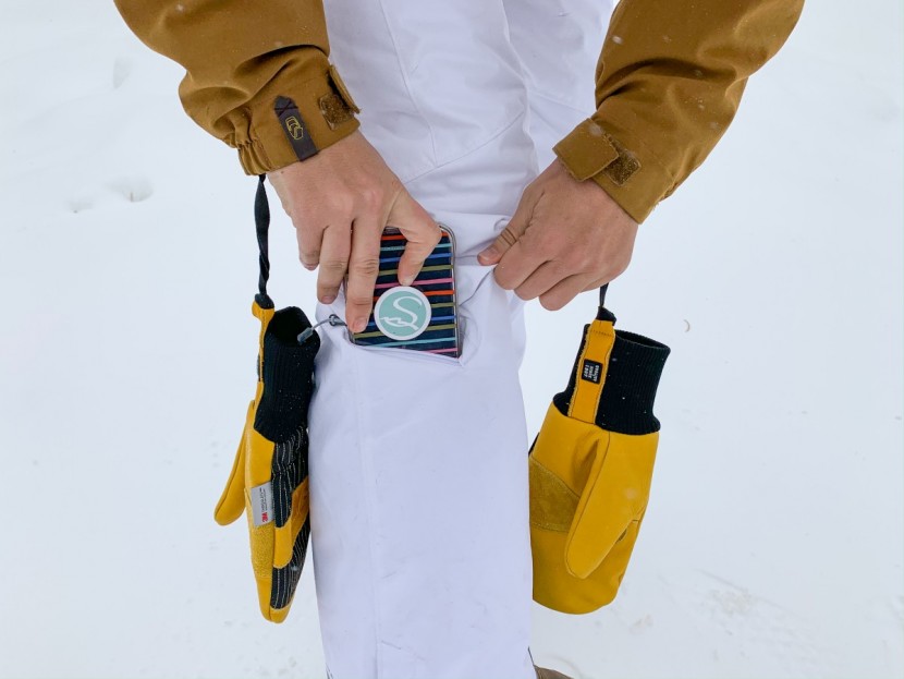 columbia bugaboo omni-heat pants for women - testing the size of the lower leg pocket. our iphone 11 fit, but we...