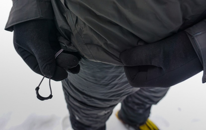 mountain hardwear exposure/2 gore-tex paclite - this rubber loop on the end of the waist drawcord masking tightening...