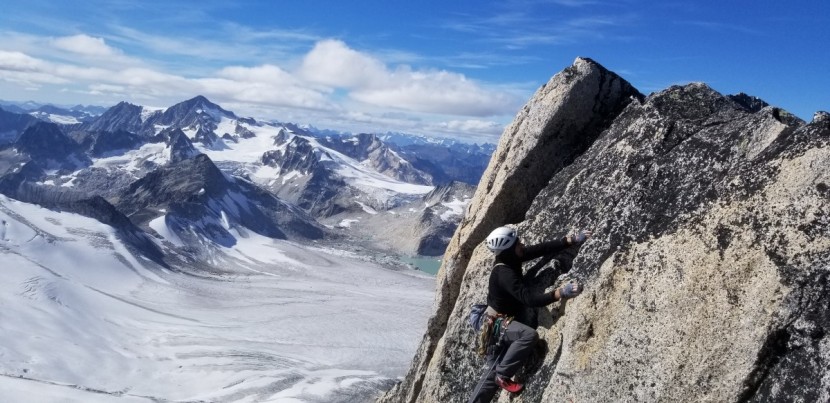 climbing cams - ben hoyt topping out the furry pink arete in the bugaboos, which...