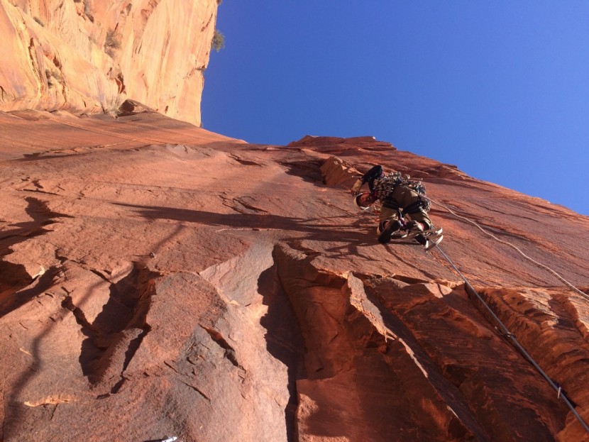climbing cams - cams! aiding the endless cracks on lunar ecstasy in zion, mid winter.