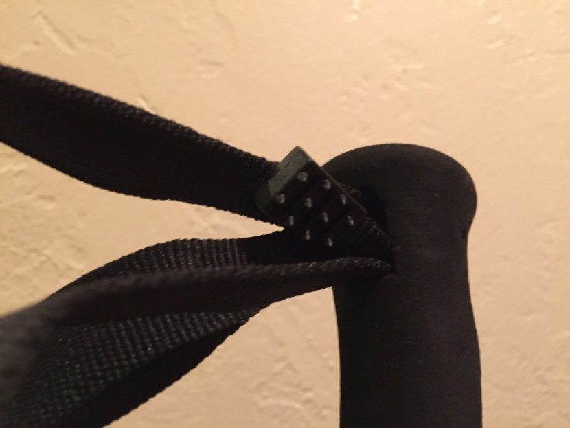 komperdell explorer contour powerlock - a small rubber wedge is attached to one end of the wrist strap...