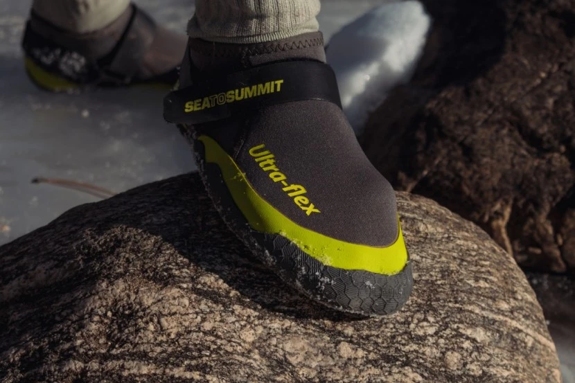 Sea to Summit Ultra Flex Booties showing flexibility and sensitivity during water sports use