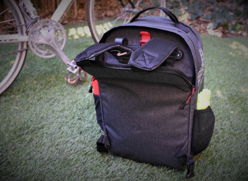 it's very easy to stow away the backpack straps for bike travel, but...