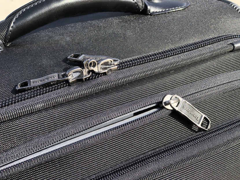 travelpro crew 11 21&quot; expandable spinner suiter - though not the best of the best, the zippers and handles of the crew...