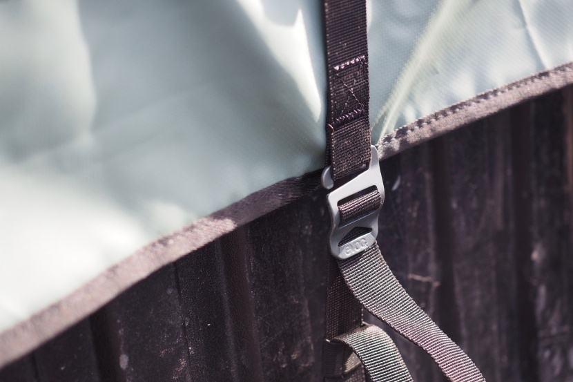 tailgate pad - evoc&#039;s metal hooks are easy to deal with, except when trying to feed...