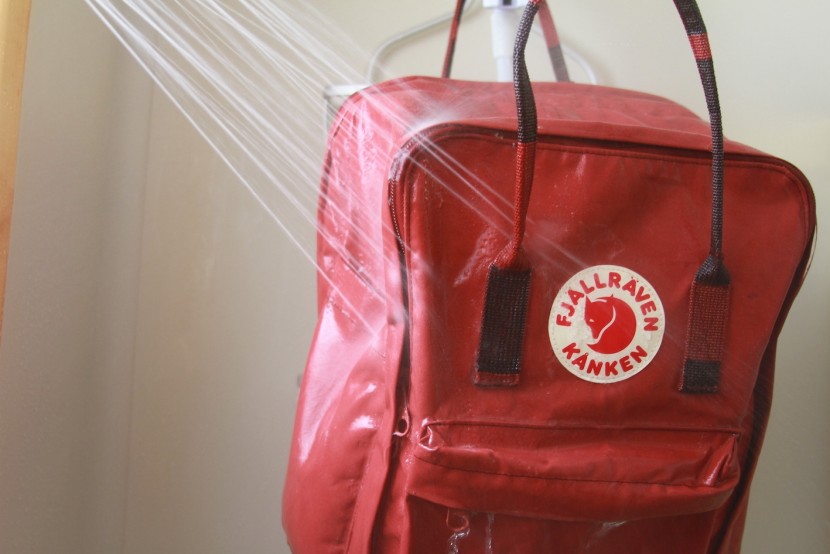 fjallraven kanken 15&quot; - taking the brunt of our shower tests. we put it under the water for...