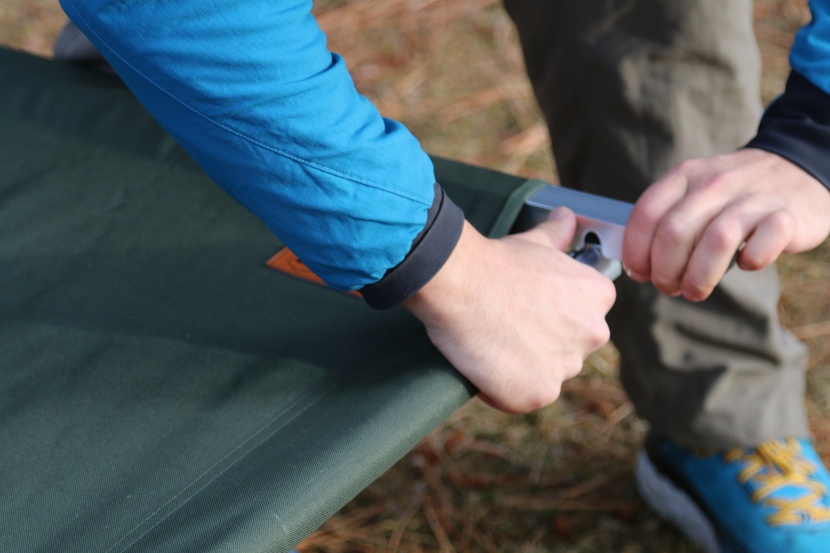 tough outdoors cot - we noticed some wear and tear on the plastic pegs that fit into the...