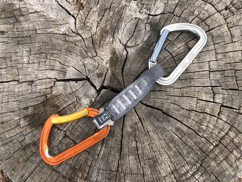 quickdraw - this is a quickdraw. the orange carabiner is for clipping the rope...