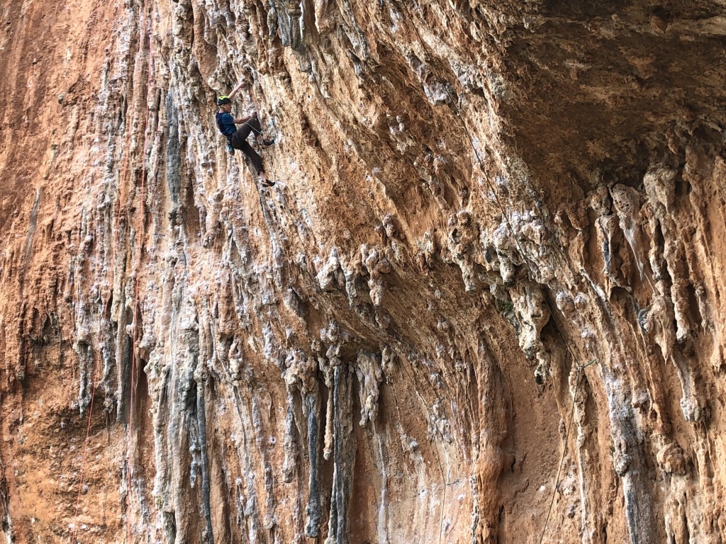 quickdraw - the author climbing steep tufas on the amazing limestone rock of the...