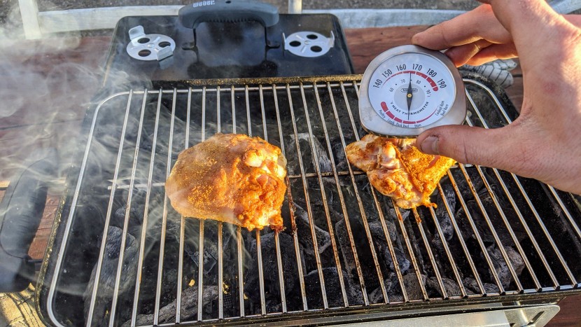 weber go-anywhere charcoal - slow roasting some dry-rubbed curry chicken to perfection on the...