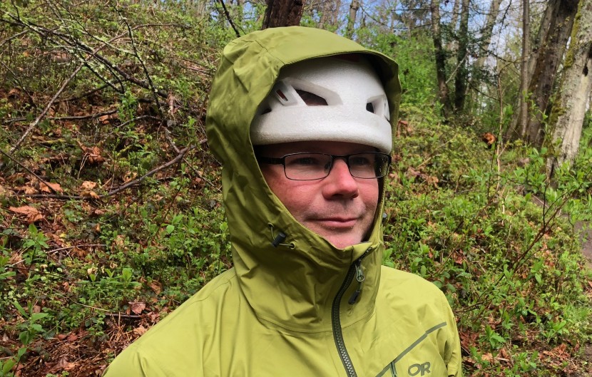 outdoor research interstellar - this hood is big enough to fit over a helmet but just barely...
