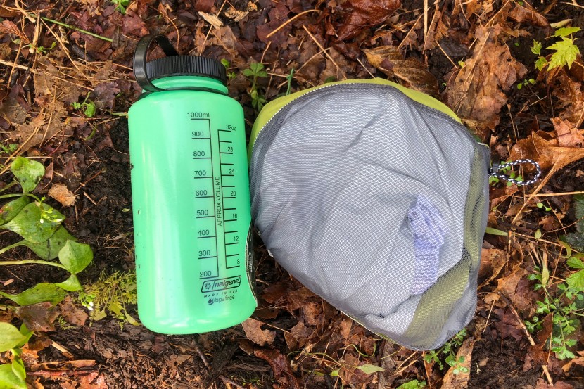 outdoor research interstellar - this model stows into a reversible pocket. it is pictured here next...