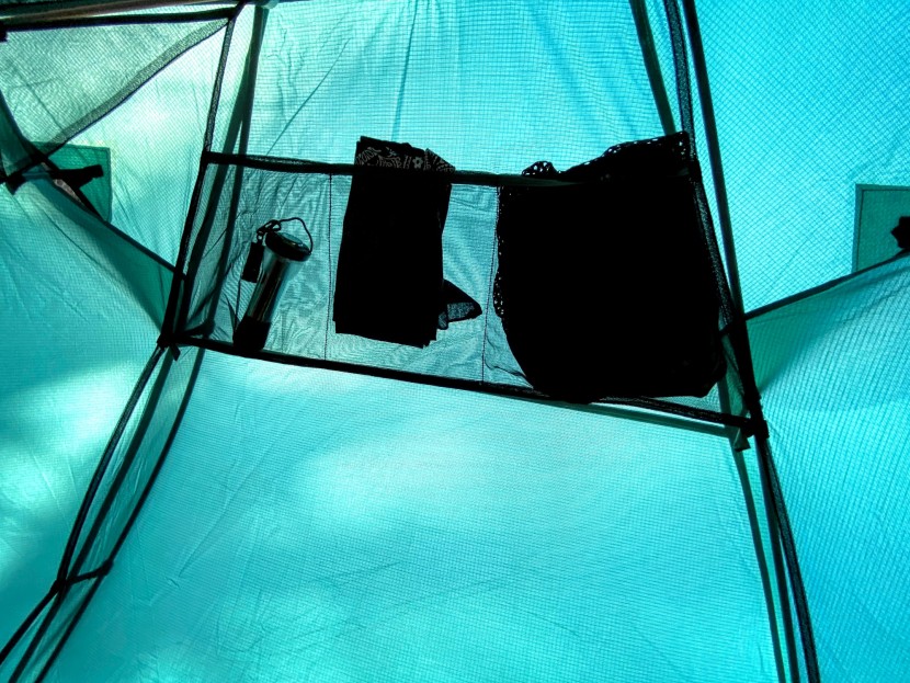 ceiling pockets are great for storage but add material to the tent...
