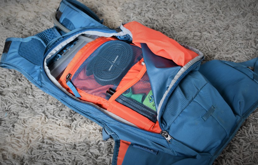 the main storage compartment houses the hydration sleeve behind a...