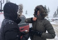 Fur ruffs and tall collars help keep the cold out. We love features...