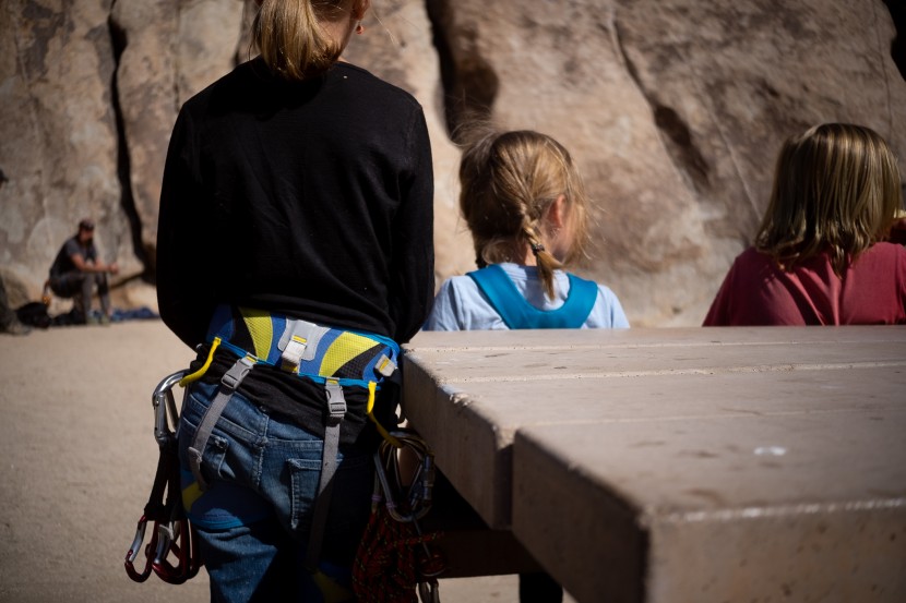 climbing harness kids - waiting for her turn to climb, luckily her harness is comfortable...