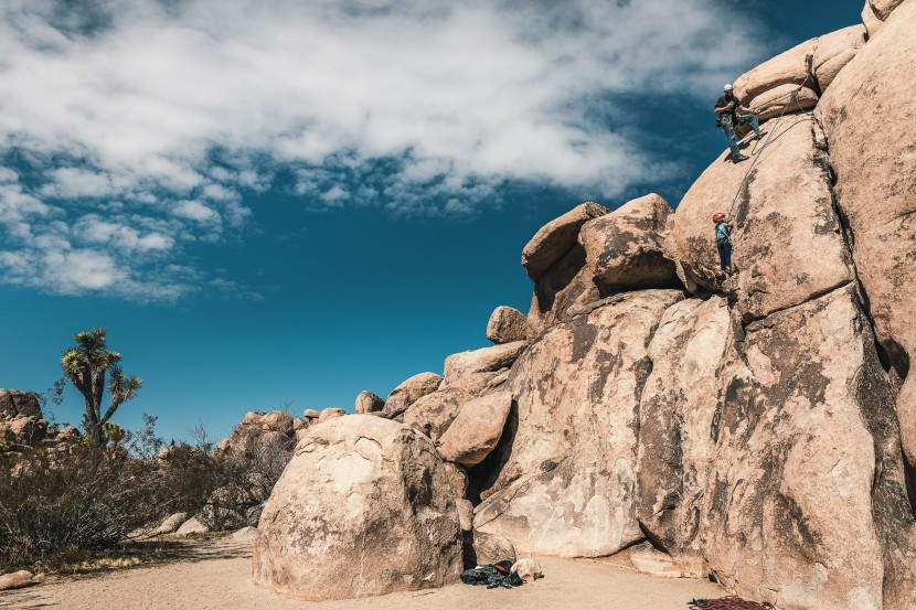 black diamond momentum full-body - dad tries to get the shot from above as kid crusher pulls the crux.