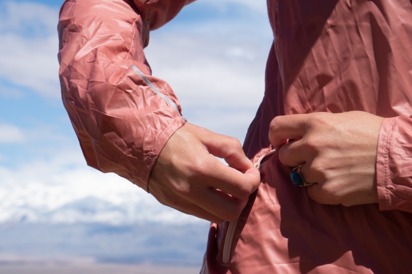 smartwool merino sport ultra light hoody for women - hidden in the right hand pocket is this jacket&#039;s ability to fold...