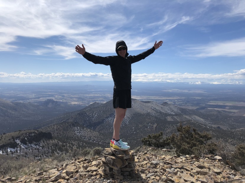 trail running shoes men - on the summit of grey butte with distant views to the three sisters...