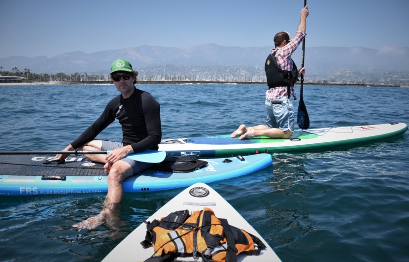 paddle board - an inflatable board&#039;s softer surface material is more forgiving than...