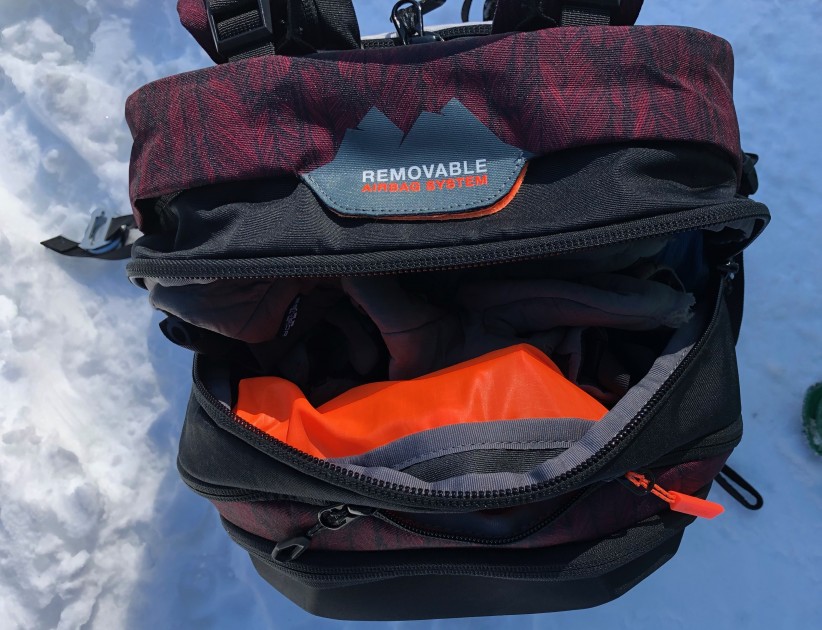 the zippers don't go down as far as a true clamshell pack, making...