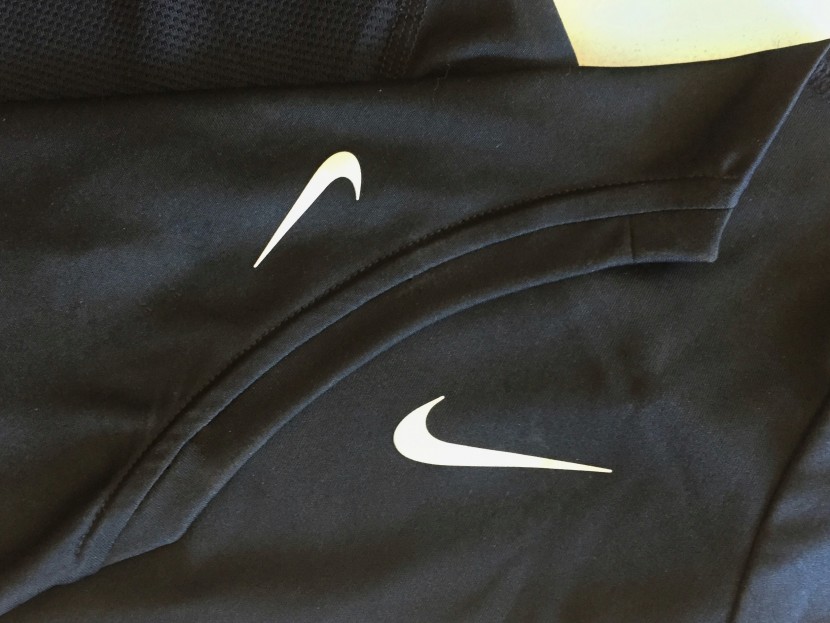 nike miler - we&#039;re always happy to see reflective decals, and on this shirt...