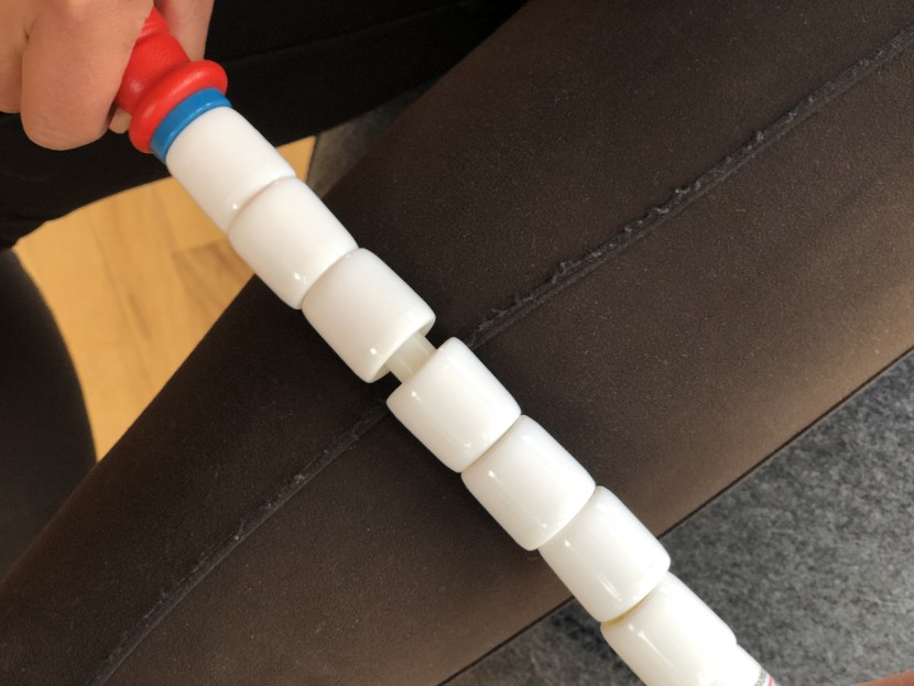 muscle roller stick - you can see the gap between beads here, as well as the amount of...