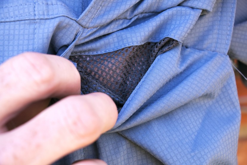 the dual chest pockets of the columbia silver ridge lite are backed...