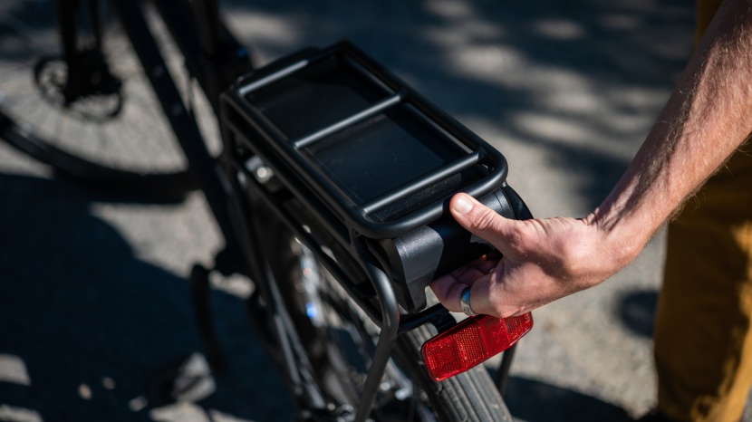 electra townie go! 7d - the battery slides into position within the cargo rack. it is easily...