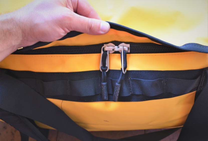 the north face base camp - although the main zipper isn&#039;t waterproof, a protective rain flap...