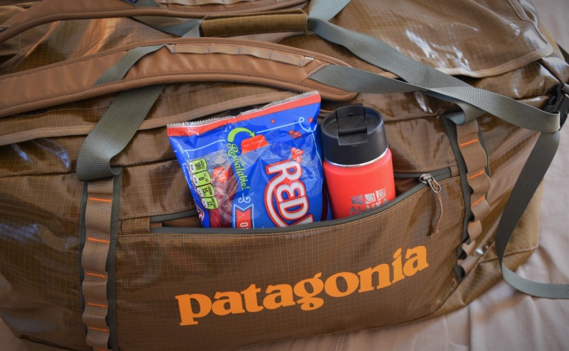 patagonia black hole duffel - while a slim side pocket might not fit bulkier items, it can...
