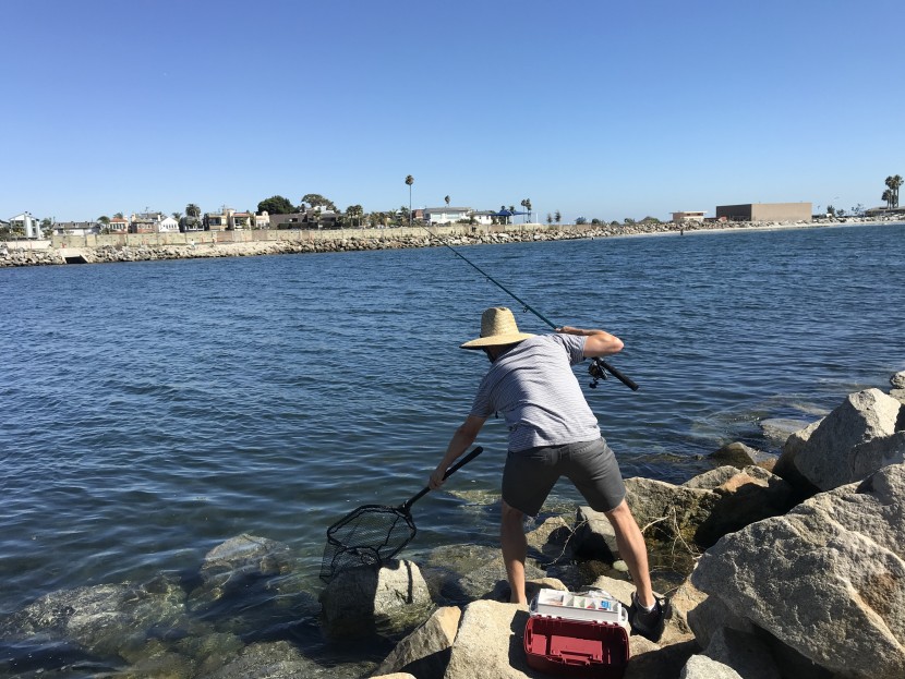 lead tester kit smith ready to land another fish while field testing.