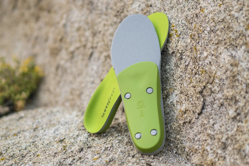 insoles - the superfeet green is made of foam and has a hard stabilizer cap.