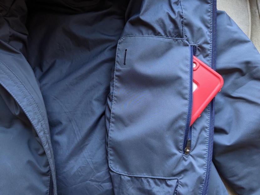 the internal chest pocket zips, is big enough for a smartphone, and...