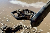 To test mud-shedding ability we find a nice sloppy mud pit to play in.