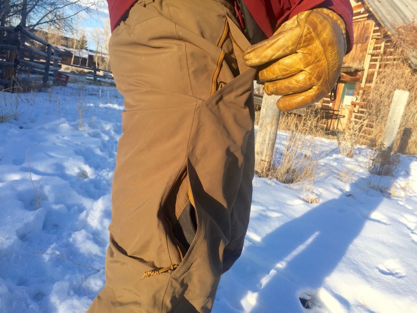 rei co-op powderbound insulated pant - a close-up of the waist and leg pockets on the rei powderbound. all...