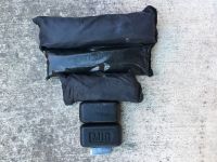 All the removable weights from our tested vests. Top to bottom:...