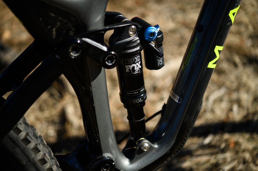 trail mountain bike - on the fox dpx2, the blue switch allows you to adjust the...