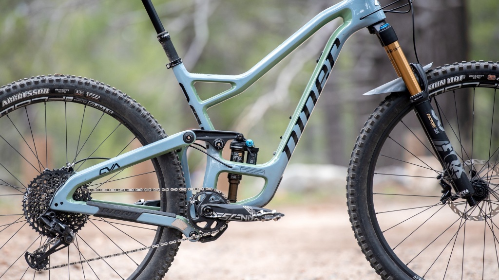 trail mountain bike - rear suspension designs all work to achieve the same goal, although...