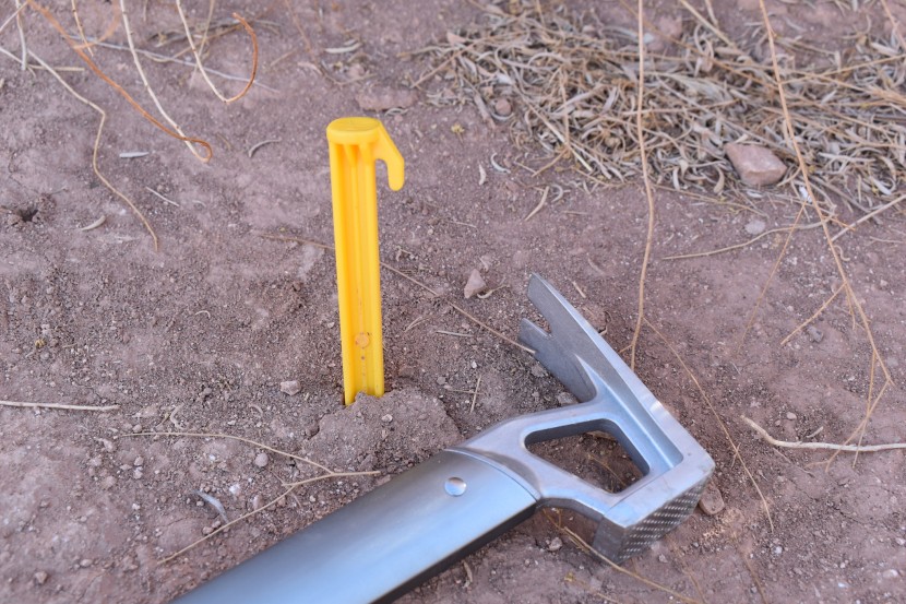 with the assistance of a hammer, coghlan's tent pegs can get the job...