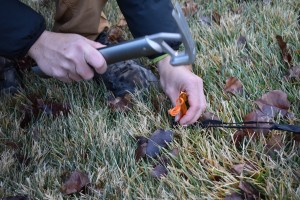 Easily hammering in the All One Tech into firm ground.