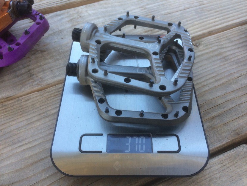 oneup components aluminum - 370-grams is pretty light for a tough set of grippy pedals.