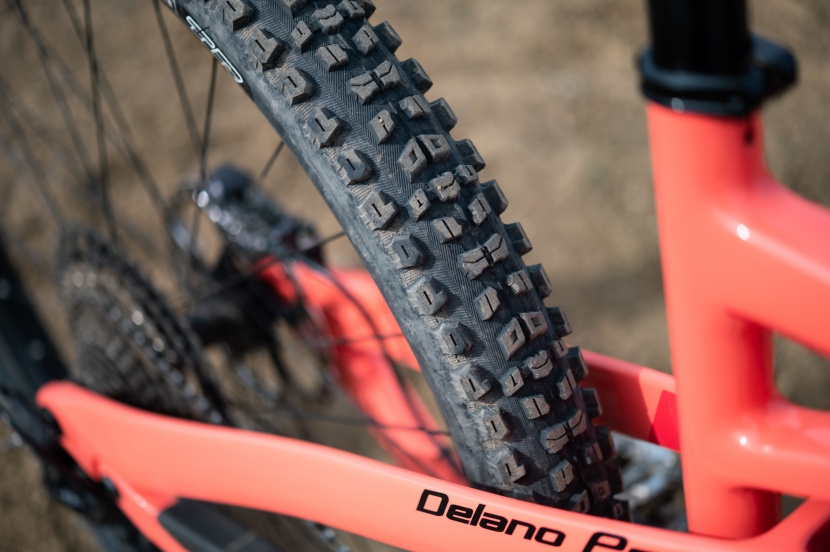 a maxxis aggressor tire in the rear is paired with a minion dhf in...