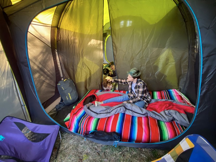 camping tent - the kids separated by the fixed, full-length room divider of the...