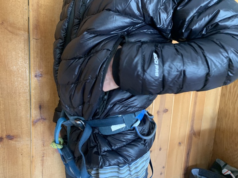 the north face summit down - the two zippered hand pockets sit high enough to remain accesible...