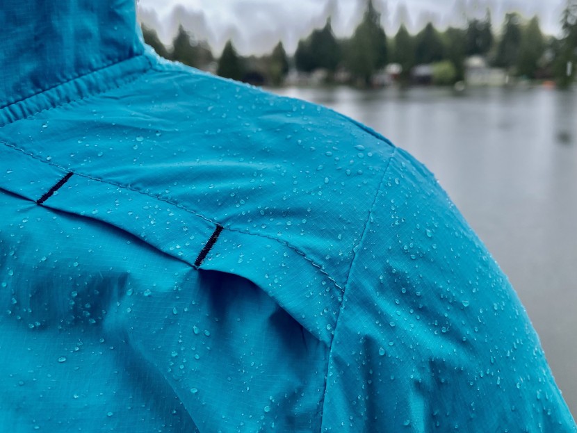 smartwool merino sport ultra light hoody for women - maximum sprinkle repellence during the unpredictable pnw spring.