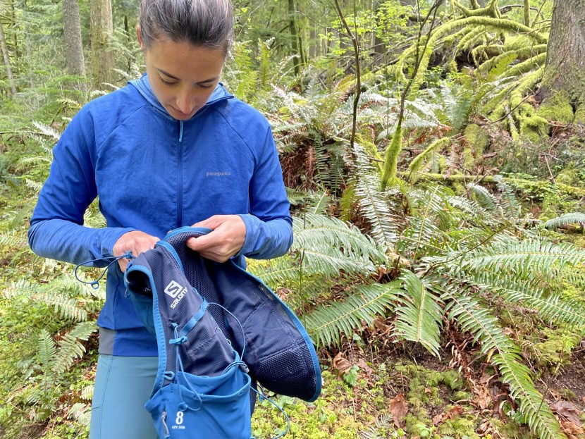 salomon adv skin 8 set - megan is digging into the deepest pocket for her secret trail snack:...