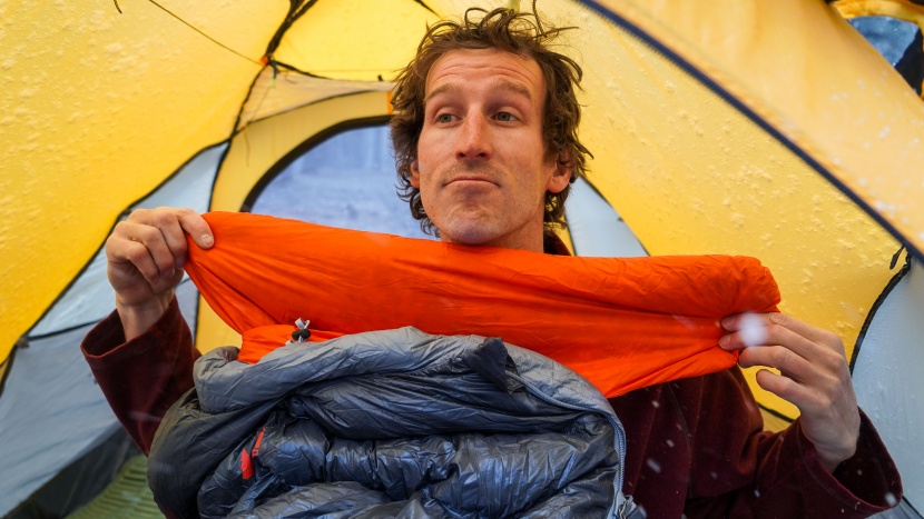 backpacking sleeping bag - features like draft collars and zipper baffles (seen here on the...